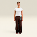Front view of The Moment After Pants, espresso wide-leg cotton French terry with mint drawstring, worn with a white tee