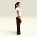 Side view of The Moment After Pants in espresso with mint contrast waistband, showing the wide leg